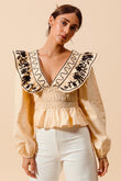 Allegra Floral Embroidered Neckline Peplum Top