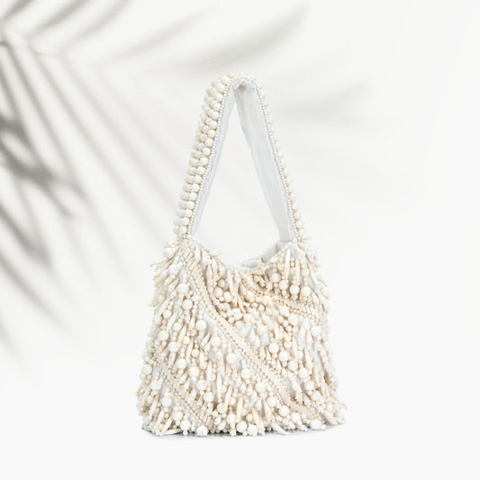 The Averlee Artisan Beaded Mini Bucket Bag in Cream