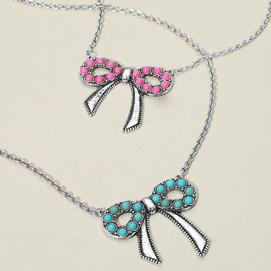 Silver Frontier Bow Keepsake Necklace